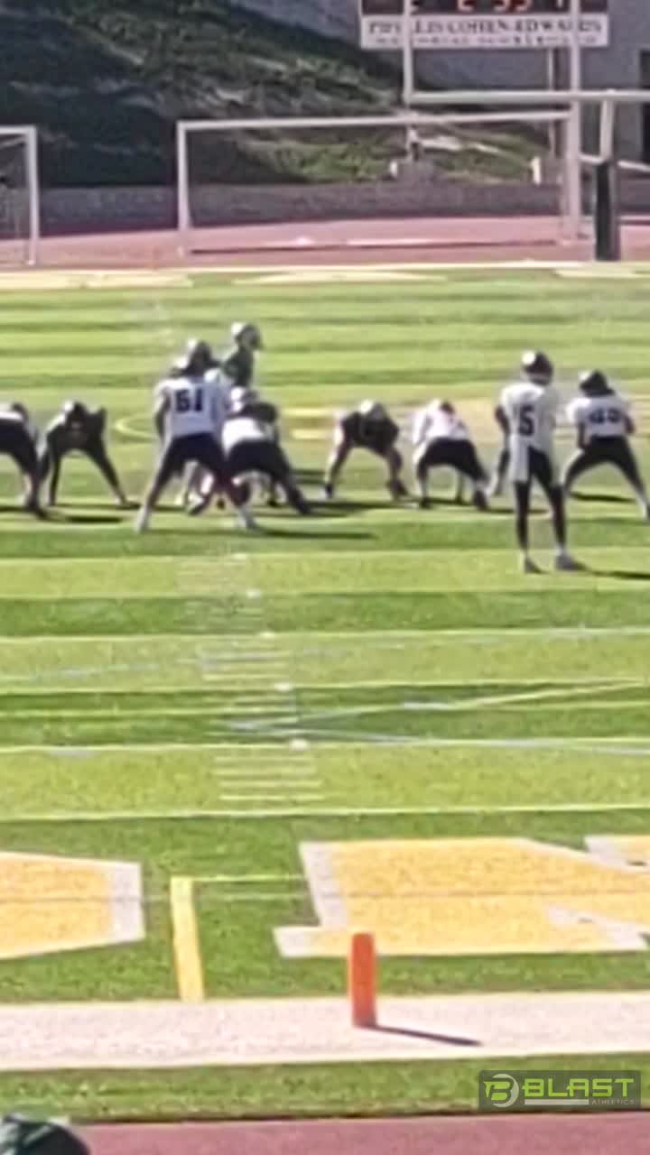 #23 linebacker bringing down the running back not afraid of making the