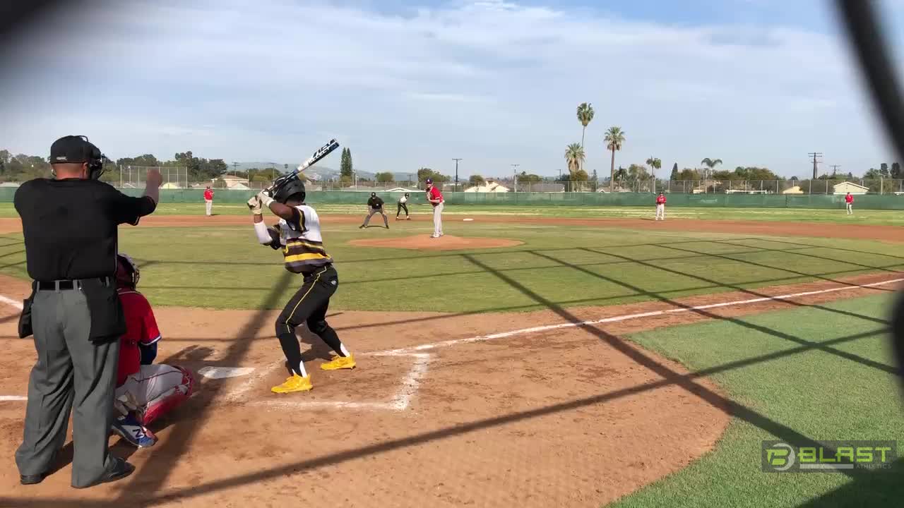 Jason Givens #19 with a great hit down the middle