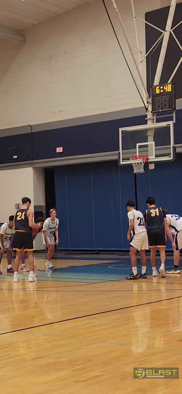 Seth with the rebound off the missed freethrow and pushes the ball up 