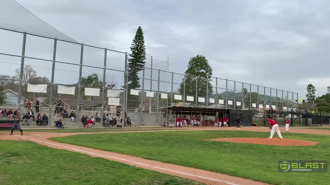 Nathaniel Tapia #13 with a great hit down the middle towards left field