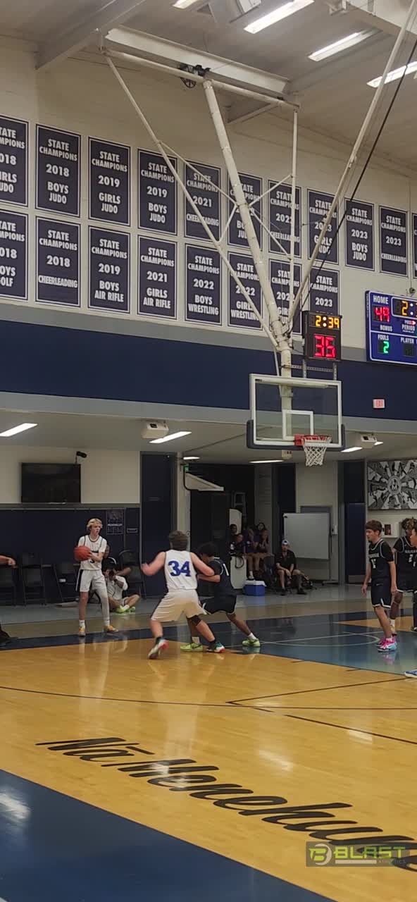 Kobe with the 3 from the out of bounds pass from Chase!!