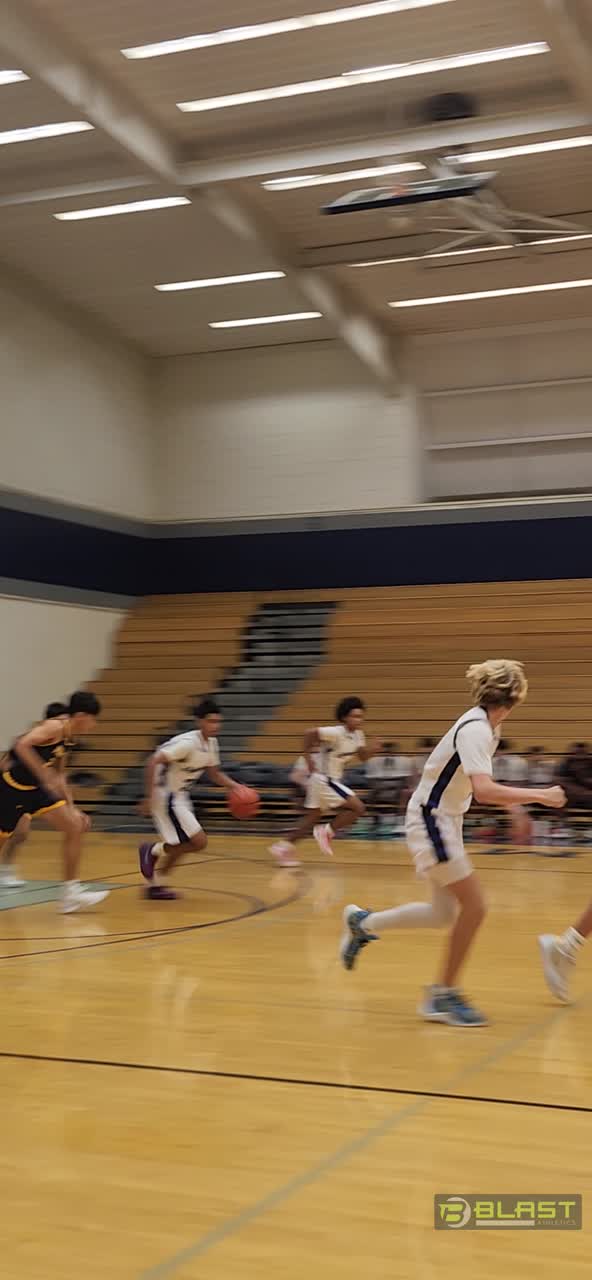 Jude with the pass to Chase for the fast break layup