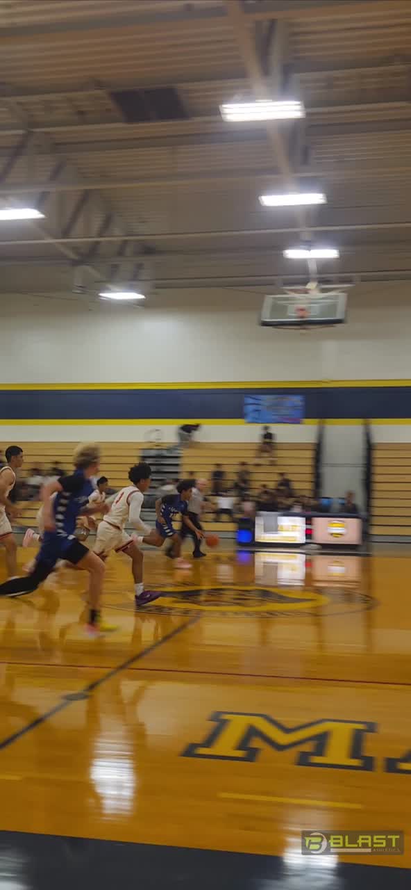 Michael with the offensive rebound and the strong put back layup
