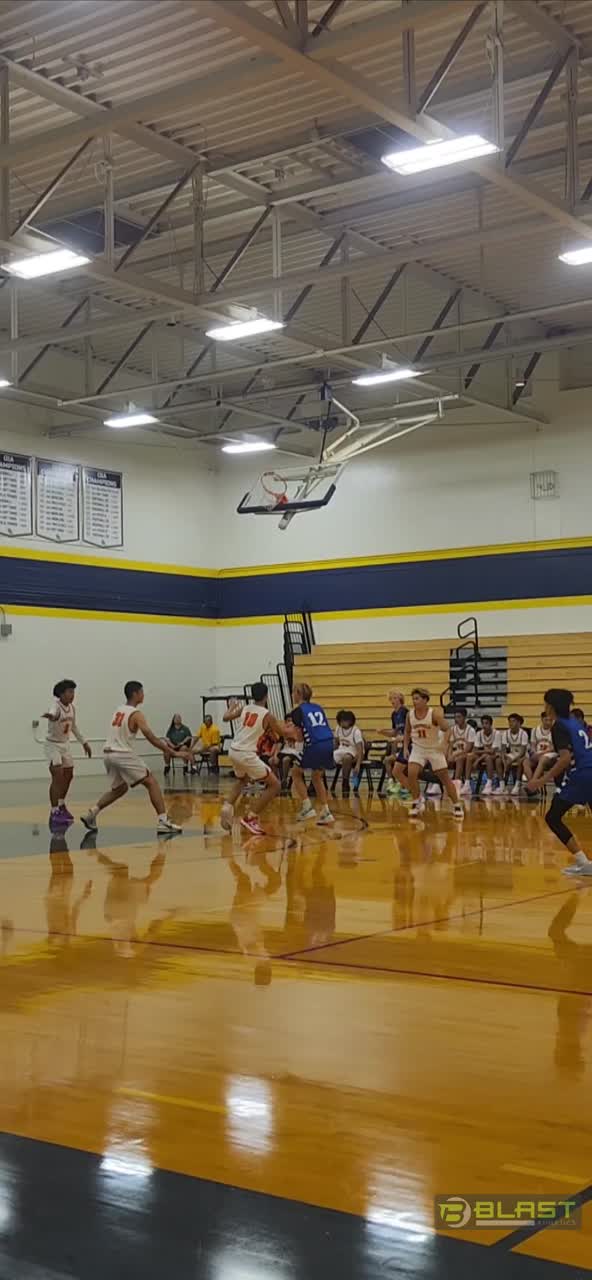Caleb with the pass to Kobe for the 3